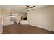 Inviting living space showcasing an open layout with hardwood floors and easy access to the kitchen at 419 W Harwell Rd, Phoenix, AZ 85041