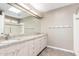 The bathroom includes a spacious shower, double vanity, and granite countertops at 4233 W Michigan Ave, Glendale, AZ 85308