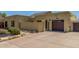 Charming single-story home with a driveway, landscaping, and a two-car garage at 4233 W Michigan Ave, Glendale, AZ 85308