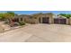 Charming single-story home with a driveway, landscaping, and a two-car garage at 4233 W Michigan Ave, Glendale, AZ 85308