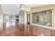 Bright living room with backyard views, stylish lighting, and access to the outdoor pool area at 4233 W Michigan Ave, Glendale, AZ 85308