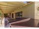 Covered patio with hot tub and view of the pool at 4233 W Michigan Ave, Glendale, AZ 85308
