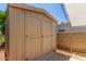Backyard shed with double doors for storage at 4233 W Michigan Ave, Glendale, AZ 85308