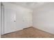 Bedroom with ceiling fan, closet, and doorway to another room at 4617 W Alicia Dr, Laveen, AZ 85339