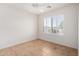 Well-lit bedroom with tile flooring, ceiling fan, and plantation shutters at 4617 W Alicia Dr, Laveen, AZ 85339