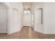 Welcoming foyer showcasing tile flooring, neutral walls, and decorative niches at 4617 W Alicia Dr, Laveen, AZ 85339