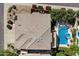 An aerial perspective of the property showcasing the home's layout and the sparkling backyard pool at 4812 E Daley Ln, Phoenix, AZ 85054
