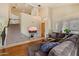 Bright and open living area with high ceilings, natural light, and a comfortable seating arrangement at 4812 E Daley Ln, Phoenix, AZ 85054