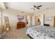 Comfortable main bedroom with a king-sized bed, ample storage, and serene ambiance at 4812 E Daley Ln, Phoenix, AZ 85054