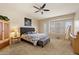 Serene main bedroom featuring a comfortable bed, ample natural light, and stylish furnishings at 4812 E Daley Ln, Phoenix, AZ 85054