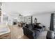 Bright living space with dining area, neutral walls, and tile flooring throughout the space at 5004 W Kaler Dr, Glendale, AZ 85301