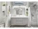 Modern bathroom features a gray vanity, white countertop and stylish shower with gray marble tile at 5015 E Cheyenne Dr # 31, Phoenix, AZ 85044