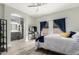An airy primary bedroom with a view to the primary bathroom and a comfortable layout at 5015 E Cheyenne Dr # 31, Phoenix, AZ 85044