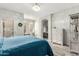 A lovely primary bedroom with ensuite bathroom access and a stylish coastal theme at 5015 E Cheyenne Dr # 31, Phoenix, AZ 85044