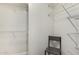 Walk-in closet with white walls and wire shelving ready for customization at 5015 E Cheyenne Dr # 31, Phoenix, AZ 85044