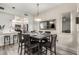 Dining area featuring a table set for six adjacent to a modern kitchen, ideal for entertaining and Gathering meals at 5015 E Cheyenne Dr # 31, Phoenix, AZ 85044