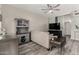 Bright living area with neutral furnishings, a wall-mounted TV, and natural light creating an airy feel at 5015 E Cheyenne Dr # 31, Phoenix, AZ 85044
