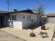 View of backyard with dog, gym equipment, and block wall providing privacy and outdoor space at 520 W Mcneil St, Phoenix, AZ 85041