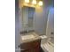 Bathroom featuring granite vanity and a modern toilet at 520 W Mcneil St, Phoenix, AZ 85041