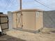 Backyard shed with matching paint and block construction matching the main dwelling at 520 W Mcneil St, Phoenix, AZ 85041