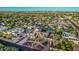 An aerial view of a neighborhood shows lush yards and a resort-style pool at 5511 N 128Th Dr, Litchfield Park, AZ 85340