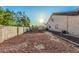 The backyard offers privacy with block fencing and a space for your custom ideas at 5511 N 128Th Dr, Litchfield Park, AZ 85340