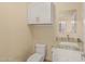 Clean bathroom featuring a granite vanity with modern fixtures at 5511 N 128Th Dr, Litchfield Park, AZ 85340