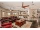 Open concept living room and kitchen with bar stool seating at 5511 N 128Th Dr, Litchfield Park, AZ 85340