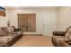 Comfortable seating area with big window and natural lighting at 5511 N 128Th Dr, Litchfield Park, AZ 85340