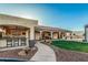 Outdoor patio with barbecue, bar seating, and plenty of room for dining al fresco at 5511 N 128Th Dr, Litchfield Park, AZ 85340