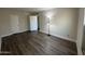 Spacious bedroom features wood-look floors, neutral walls, and ample natural light at 555 N May -- # 29, Mesa, AZ 85201