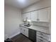 Modern kitchen with stainless steel appliances, granite countertops, and white cabinetry at 555 N May -- # 29, Mesa, AZ 85201