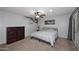 Comfortable bedroom with carpet floors, closet, and a tree-themed wall decoration at 5634 N 39Th Ave, Phoenix, AZ 85019
