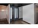Modern entryway featuring stylish doors, sleek walls, and a convenient closet space at 5634 N 39Th Ave, Phoenix, AZ 85019