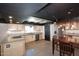 Modern kitchen with concrete floors, stainless steel appliances, and custom cabinets at 5634 N 39Th Ave, Phoenix, AZ 85019