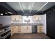 Bright kitchen with stainless steel appliances, custom cabinets and plenty of natural light at 5634 N 39Th Ave, Phoenix, AZ 85019