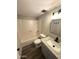 Bathroom featuring modern sink and vanity, tub and shower combo, and a clean, functional layout at 5723 N 44Th Ln, Glendale, AZ 85301