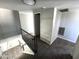 Upper level hallway and stairway with neutral colors, ample lighting, and wood flooring at 5723 N 44Th Ln, Glendale, AZ 85301