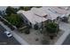 Aerial view of the residence featuring a well-maintained landscape, tiled roof, desert landscaping, and a serene neighborhood at 621 W Desert Ave, Gilbert, AZ 85233
