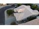 An aerial view of a well-maintained property showcasing the roof, landscaping, and surrounding neighborhood at 621 W Desert Ave, Gilbert, AZ 85233
