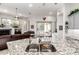 Open concept kitchen with granite countertops and views to other rooms at 621 W Desert Ave, Gilbert, AZ 85233