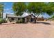 Charming single-story home featuring a well-maintained yard and a two car garage at 7232 W Sunnyside Dr, Peoria, AZ 85345