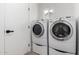 Clean laundry room equipped with modern washer and dryer units, ensuring efficient laundry tasks at 7232 W Sunnyside Dr, Peoria, AZ 85345