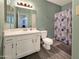Well-maintained bathroom with vanity, good lighting, and shower with curtain at 750 E Northern Ave # 2088, Phoenix, AZ 85020