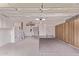 Spacious garage with ample storage cabinets and a clean, painted floor at 7904 E Madero Ave, Mesa, AZ 85209