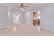 Open concept living room features tile floors and natural light at 7904 E Madero Ave, Mesa, AZ 85209