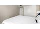 Clean bedroom featuring a bright sliding closet door and light walls at 7915 E Keim Dr, Scottsdale, AZ 85250