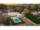 Beautiful aerial view of a backyard pool and surrounding neighborhood at 8501 E Appaloosa Trl, Scottsdale, AZ 85258