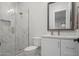 This bathroom features a glass shower, white marble details, and sleek bronze fixtures at 8501 E Appaloosa Trl, Scottsdale, AZ 85258