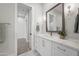 Stylish bathroom boasts a marble vanity, bronze fixtures, and a well-lit mirror at 8501 E Appaloosa Trl, Scottsdale, AZ 85258